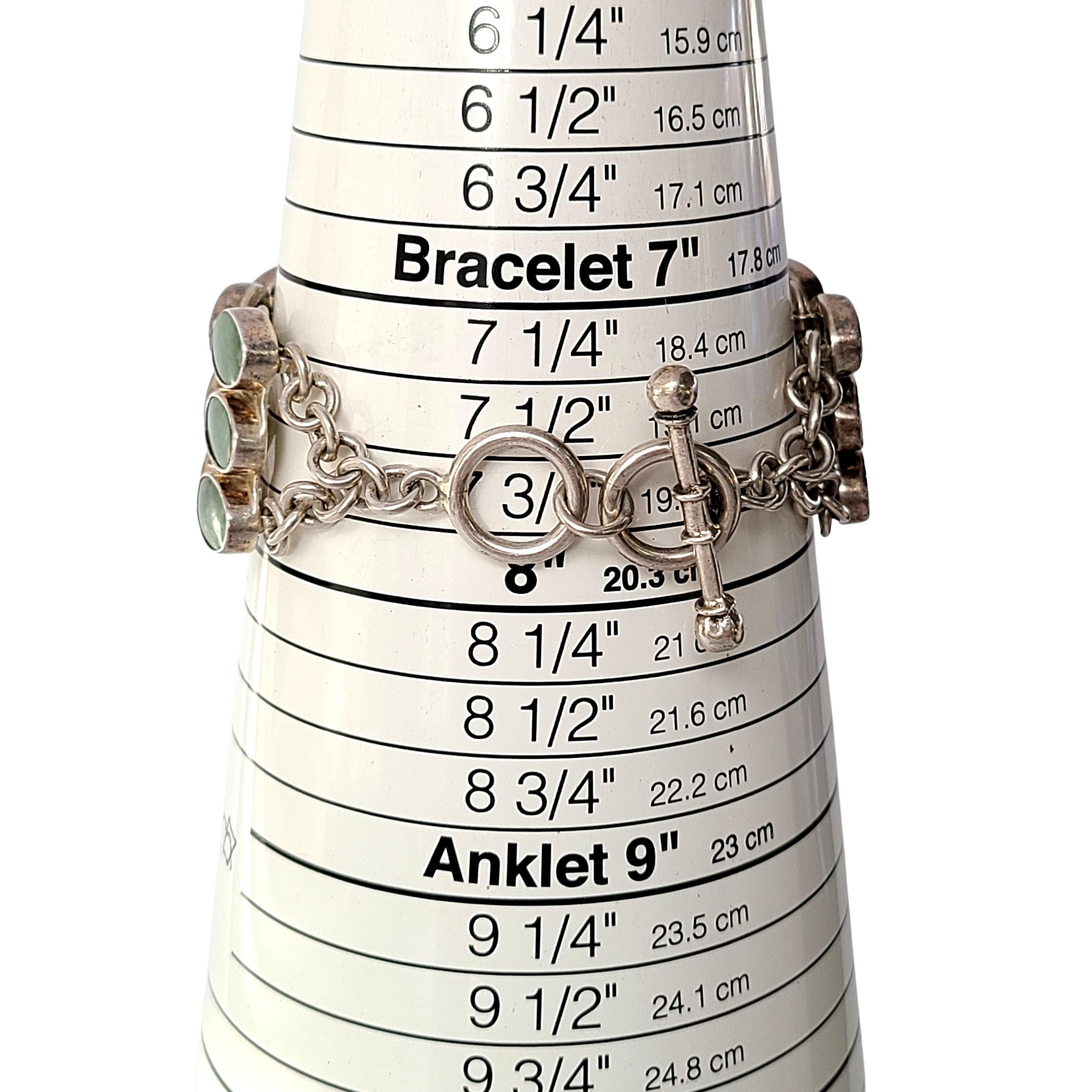 Bracelet large à bascule en argent et pierres vertes en vente 3