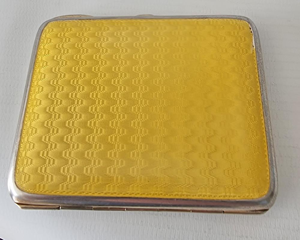 A very pretty double side, silver and imperial yellow guilloche enamel cigarette or card case. Superb engine turned design. Inside case, which is gilded, marked with silver marks of 925, for silver content, numbered 7, and 'made in Norway, along