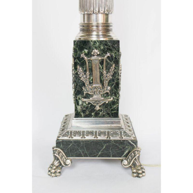 Silver and Marble Neoclassical tall table lamp. Silver plate and Marble. Monopodium lions feet, Decorative shield of lyre and laurel leaves. Very solid and heavy. Two Light Cluster. Early 20th Century. Completely rewired and restored, with a