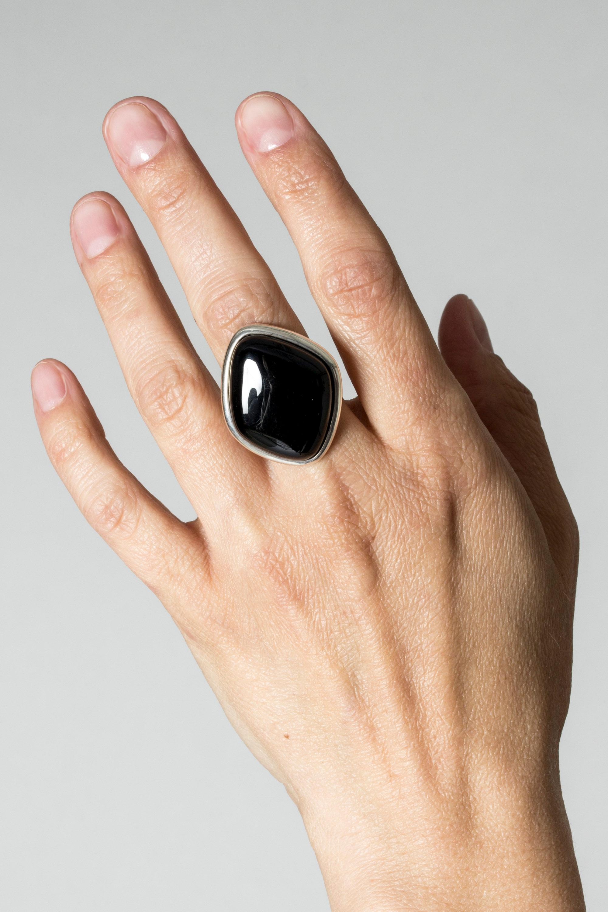 Such a cool silver ring from Niels Erik From with a large, smoothly cut, jet black onyx stone. The perfect accessory for the expressive minimalist.