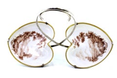 Silver and porcelain spice rack with painted country motifs