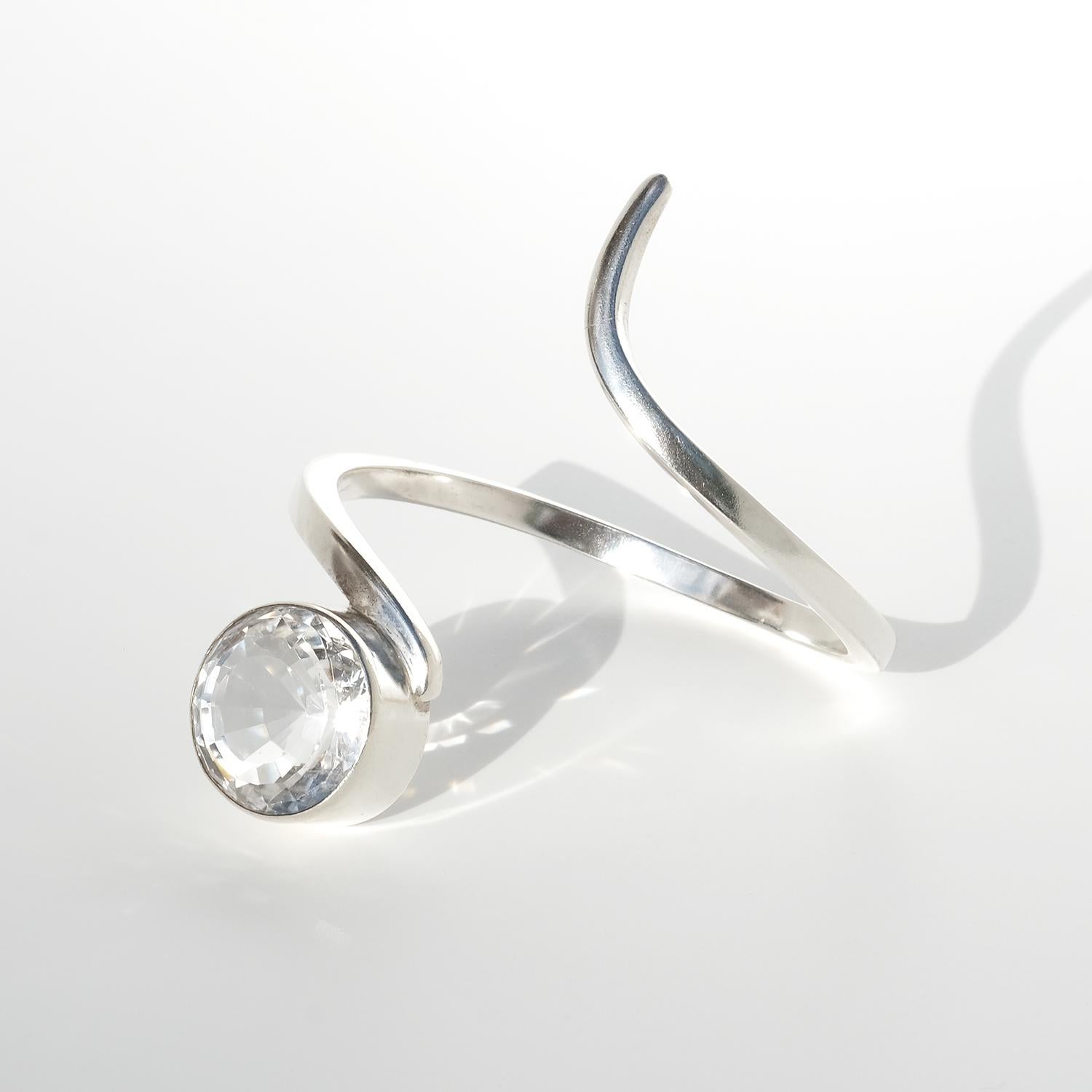 Manschettenarmband aus Silber und Bergkristall von Isaac Cohen, hergestellt 1966 (Brillantschliff) im Angebot