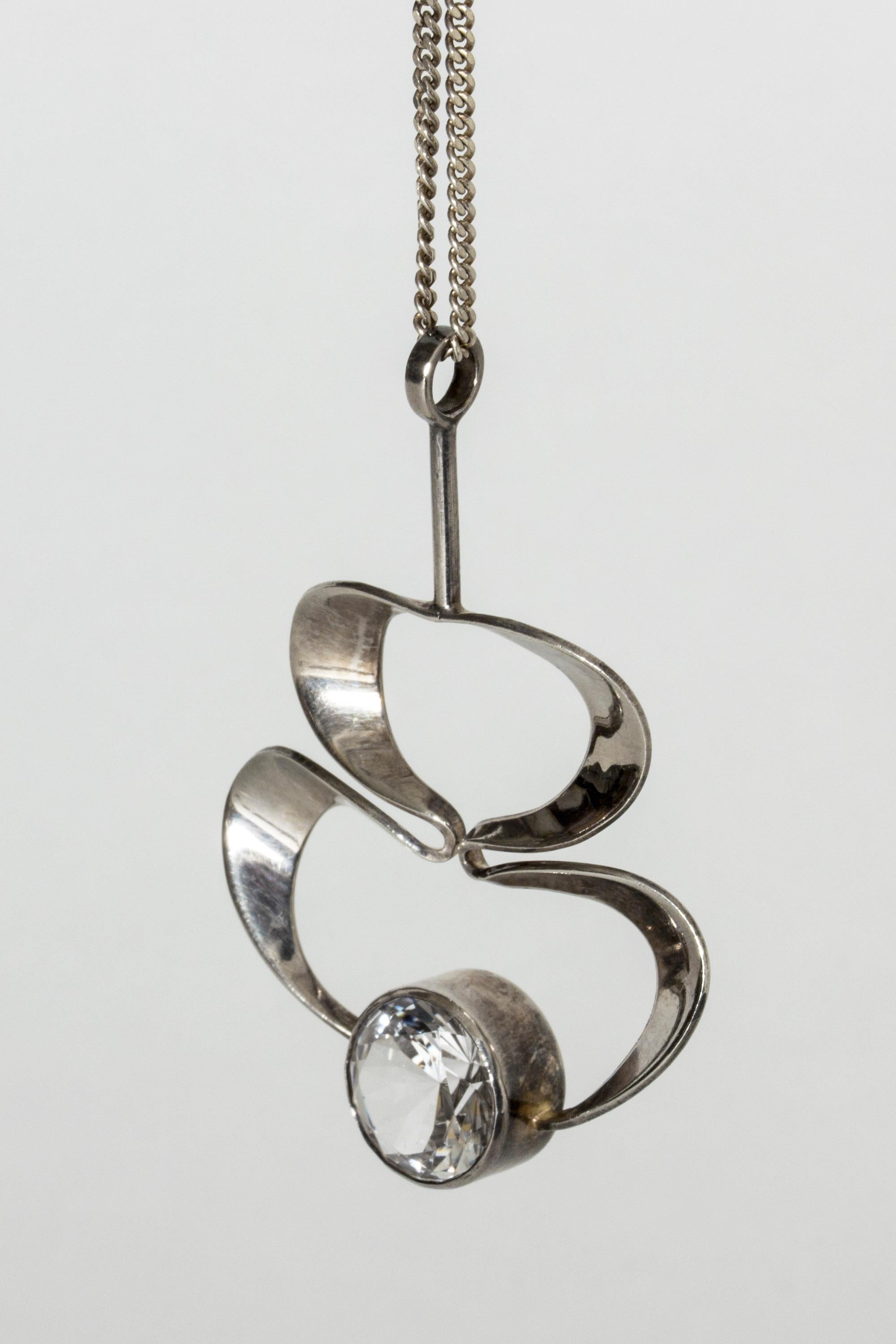 Lovely silver pendant with a round rock crystal from Alton. Large, eye-catching, billowing design.
