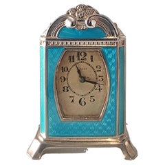 Reloj en miniatura de carruaje o tocador de plata y subesmalte guilloché turquesa