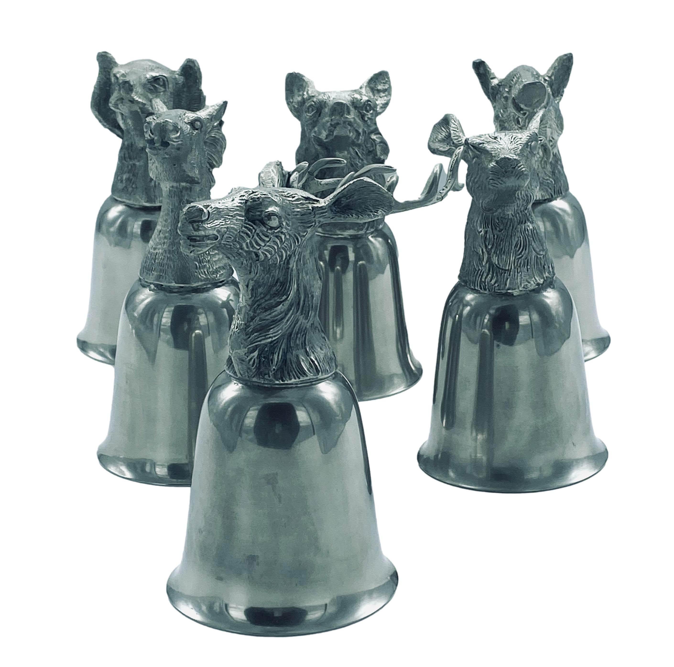 Rare set of mugs complete with animal groupings, the mugs are nickel plated and the cast heads are silver plated, each head is struck with the 