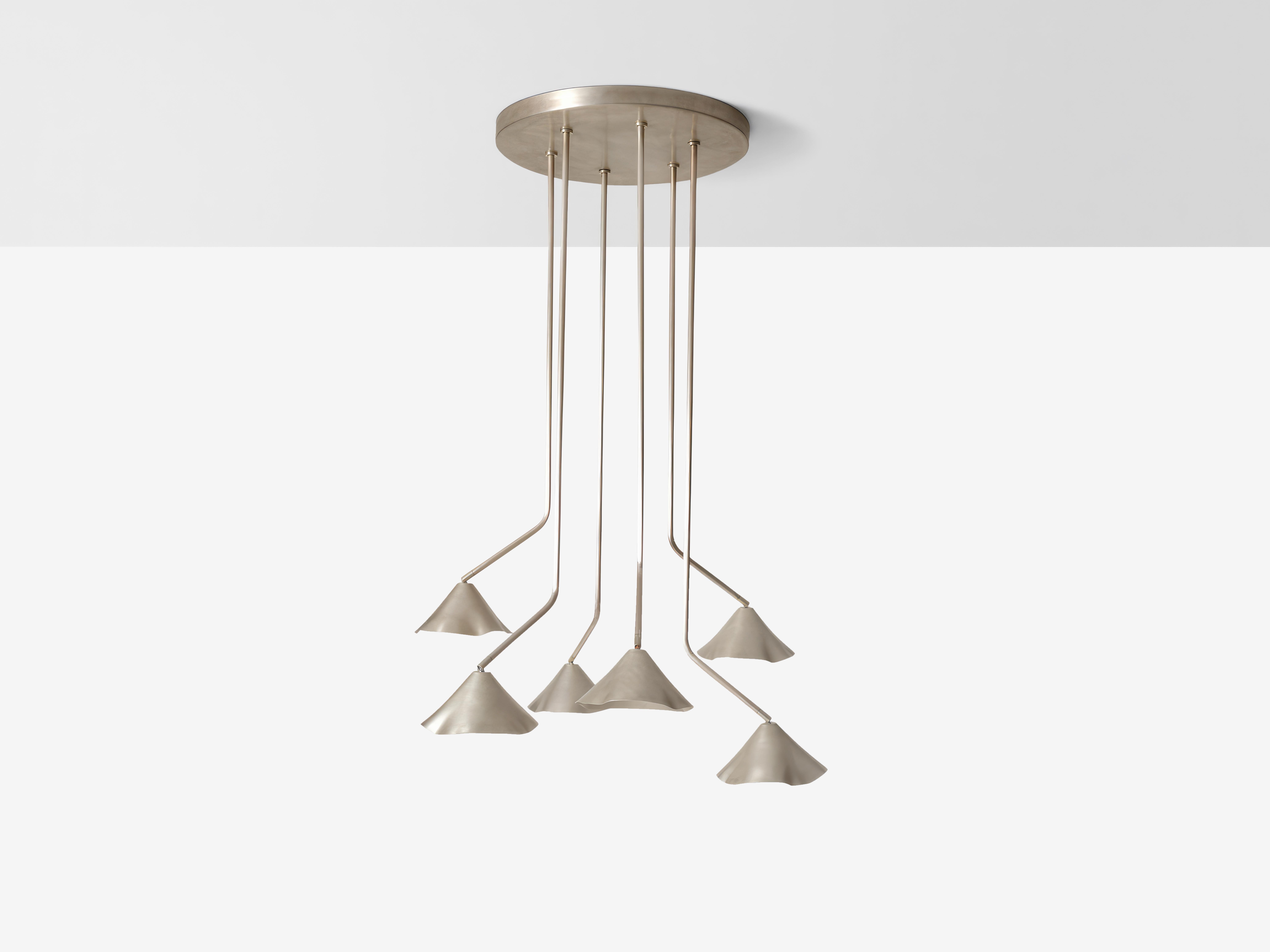 Silver Antica III Chandelier by OHLA STUDIO
Dimensions: D 100 x W 100 x H 180 cm 
Materials: Copper.
14 kg

Available in other finishes: Silver, Forest, and Teal.

A pre-Hispanic smithing tradition thrives by recycling copper scraps into