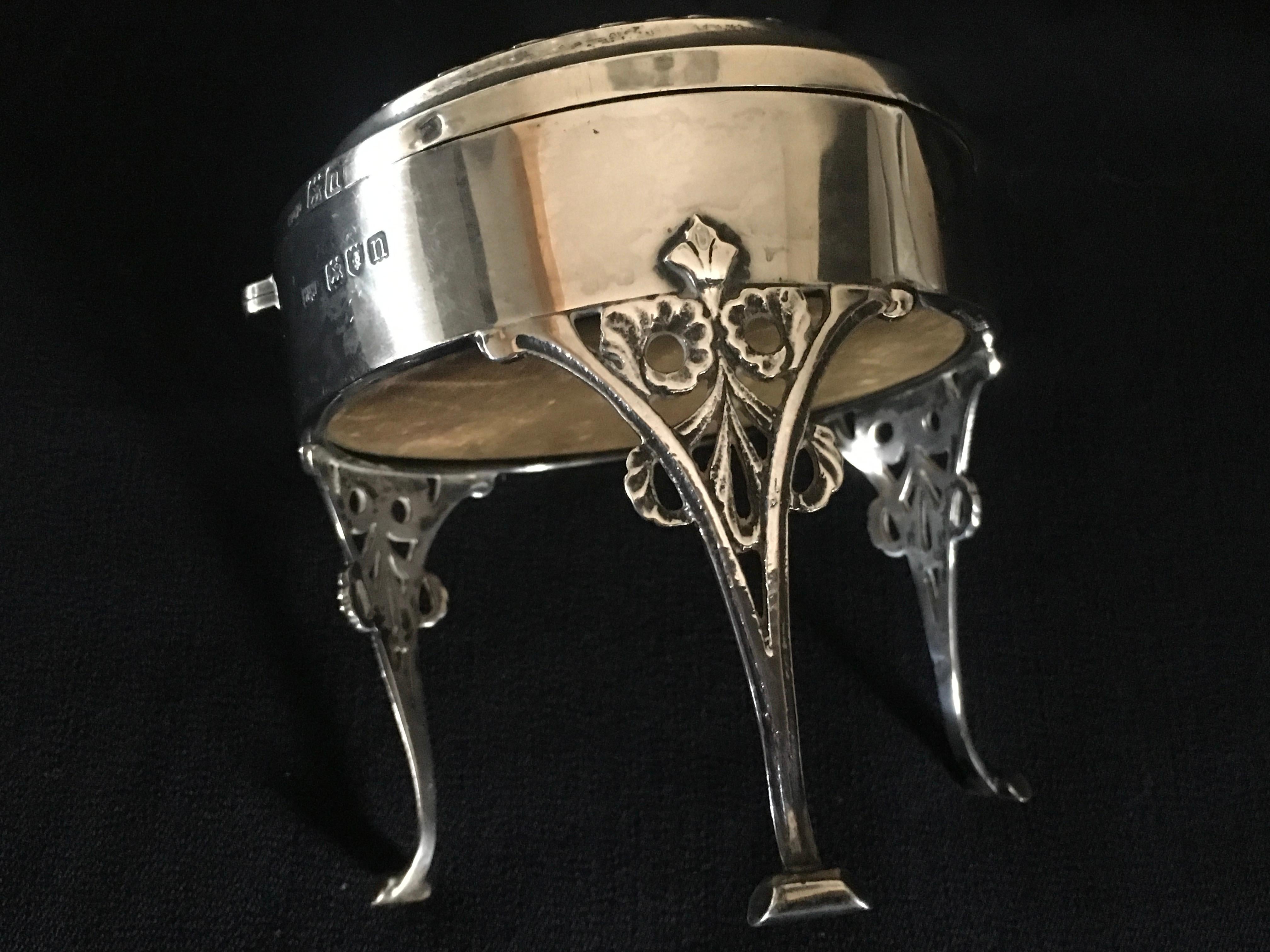 Silver Antique Jewellery Ring or trinket box by makers Mappin & Webb.
Made in London in 1916.
With a heavy green velvet lining, standing on three very elegant legs of art nouveau design.
Fully hallmarked and stamped Mappin & Webb on the