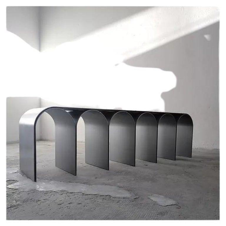 Steek Gold arch bench by Pietro Franceschini
Sold exclusively by Galerie Philia
Materials: Polished Steel
Other finishes available: brass finish, satin, blackened
Dimensions: W 155 x L 33 x 43cm
Manufacturer: Prinzivalli

Also available in