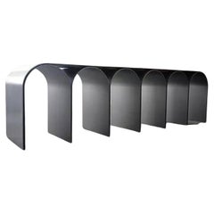 Banc en forme d'arc en argent en acier poli de Pietro Franceschini
