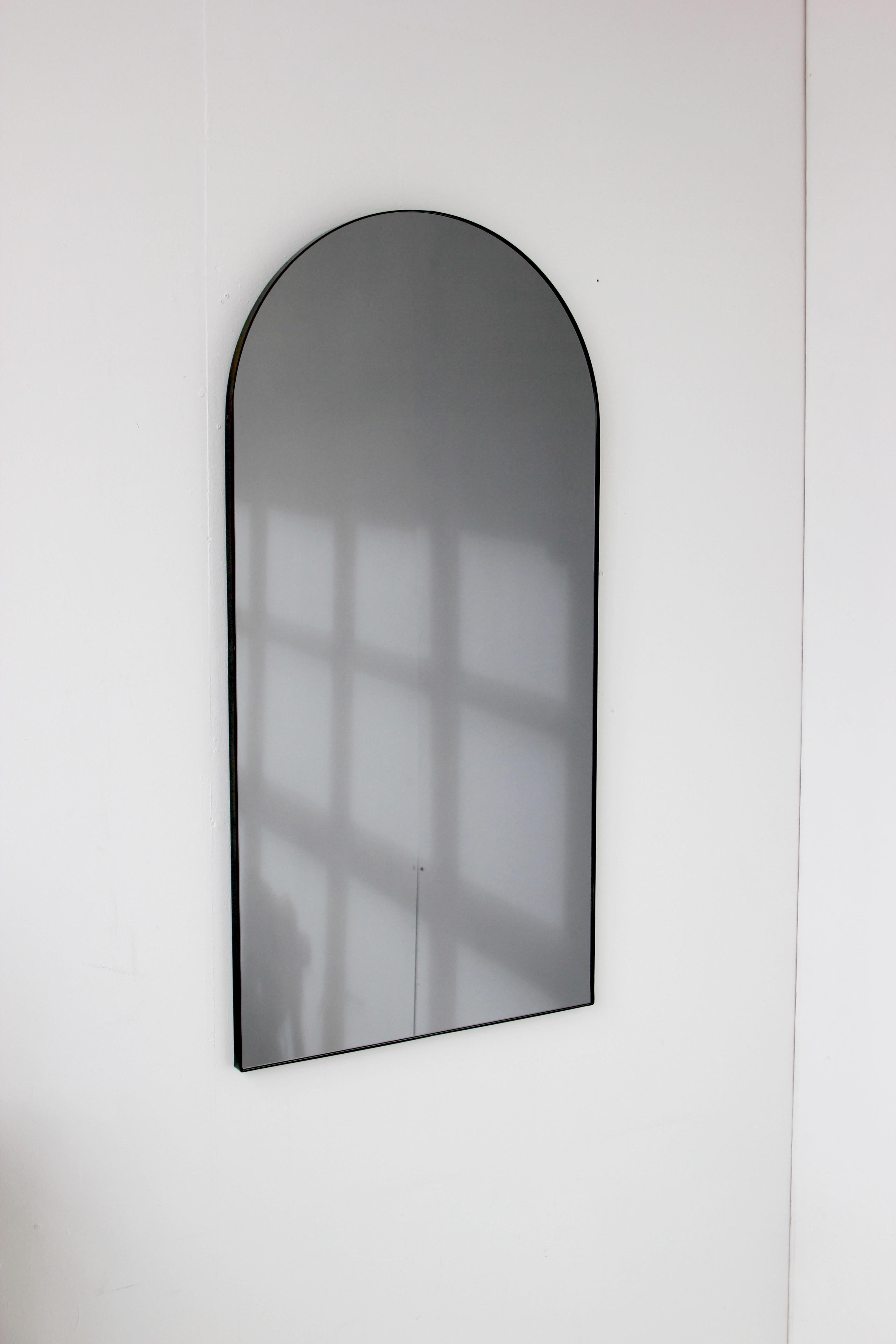 Delightful handcrafted silver long arched mirror with a bronze patinated frame. Also available with a brass frame

Ideal above a console table in the hallway, above a beautiful fireplace, in the bedroom or in the bathroom.

Available with a