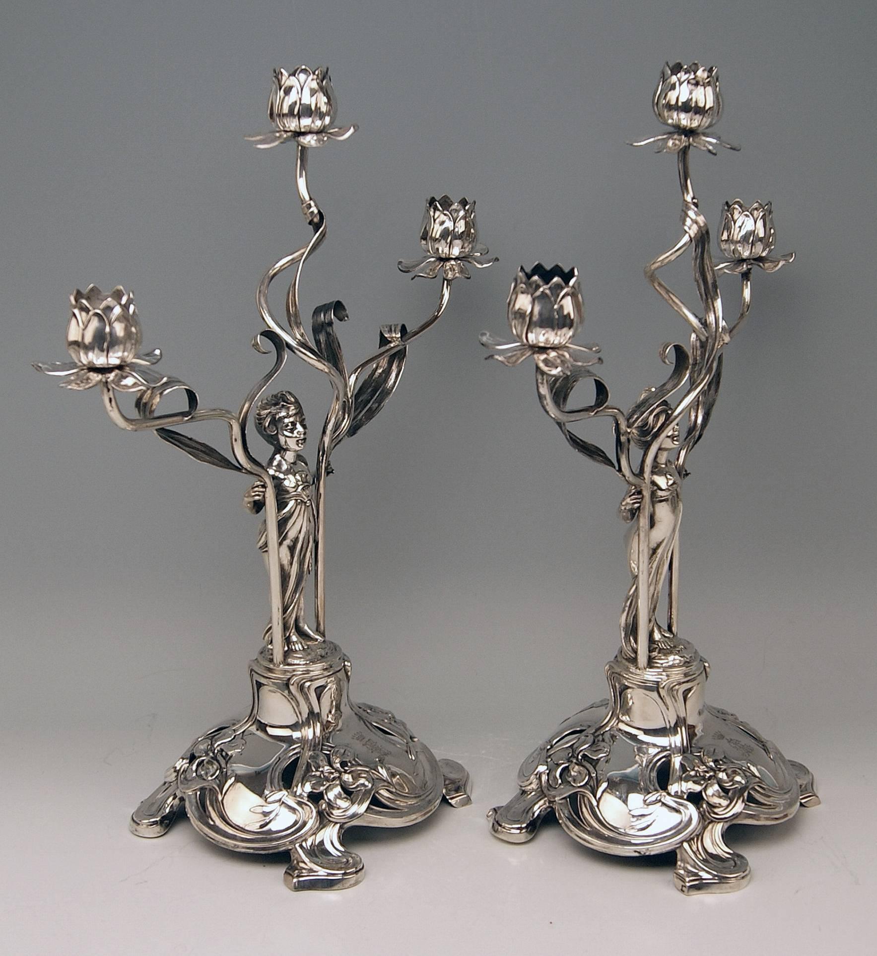 Silver German pair of candlesticks / candleholders, made by Schoellkopf (Pforzheim / Germany).

Art Nouveau (made circa 1900)
Silver 800
branded by German Crescent with Crown
Prague silver import sign of 1872-1902 existing, too
Manufactory: