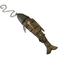 Señuelo de pesca koi articulado de plata con cadena