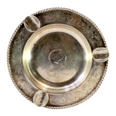 Silver ashtray w/ corded friezes, engraved garlands
4 inlaid coins of D Luís