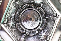 Silver ashtray w/ embossed pearly rim & coin applications as a cigarette holder
