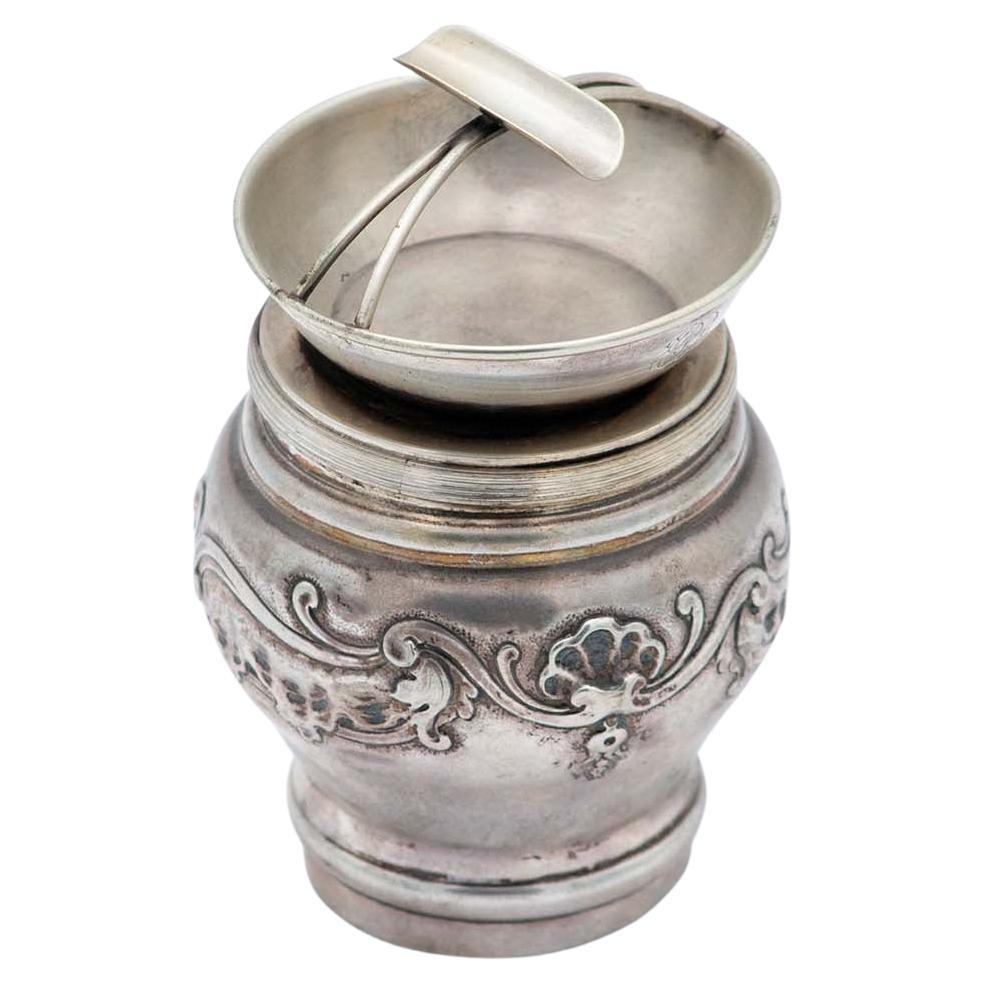 Silver ashtray with cigarette holder