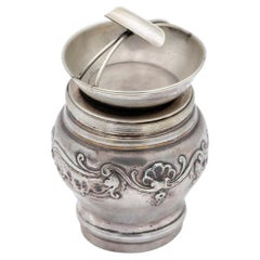 Silver ashtray with cigarette holder