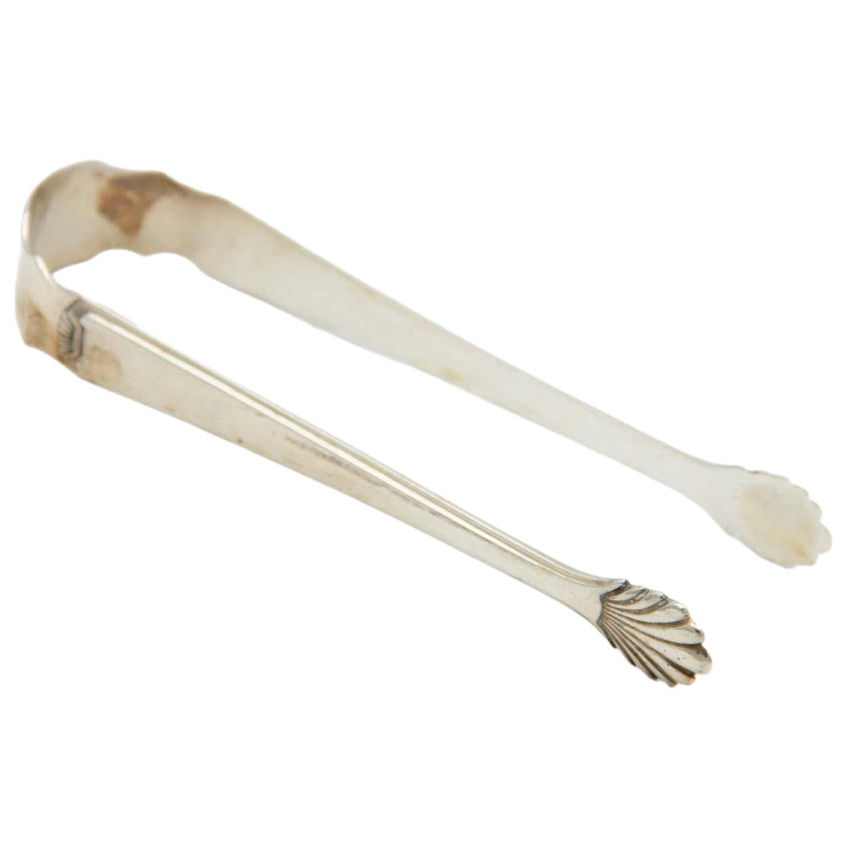 Silver asparagus or salad tongs with reliefs depicting asparagus