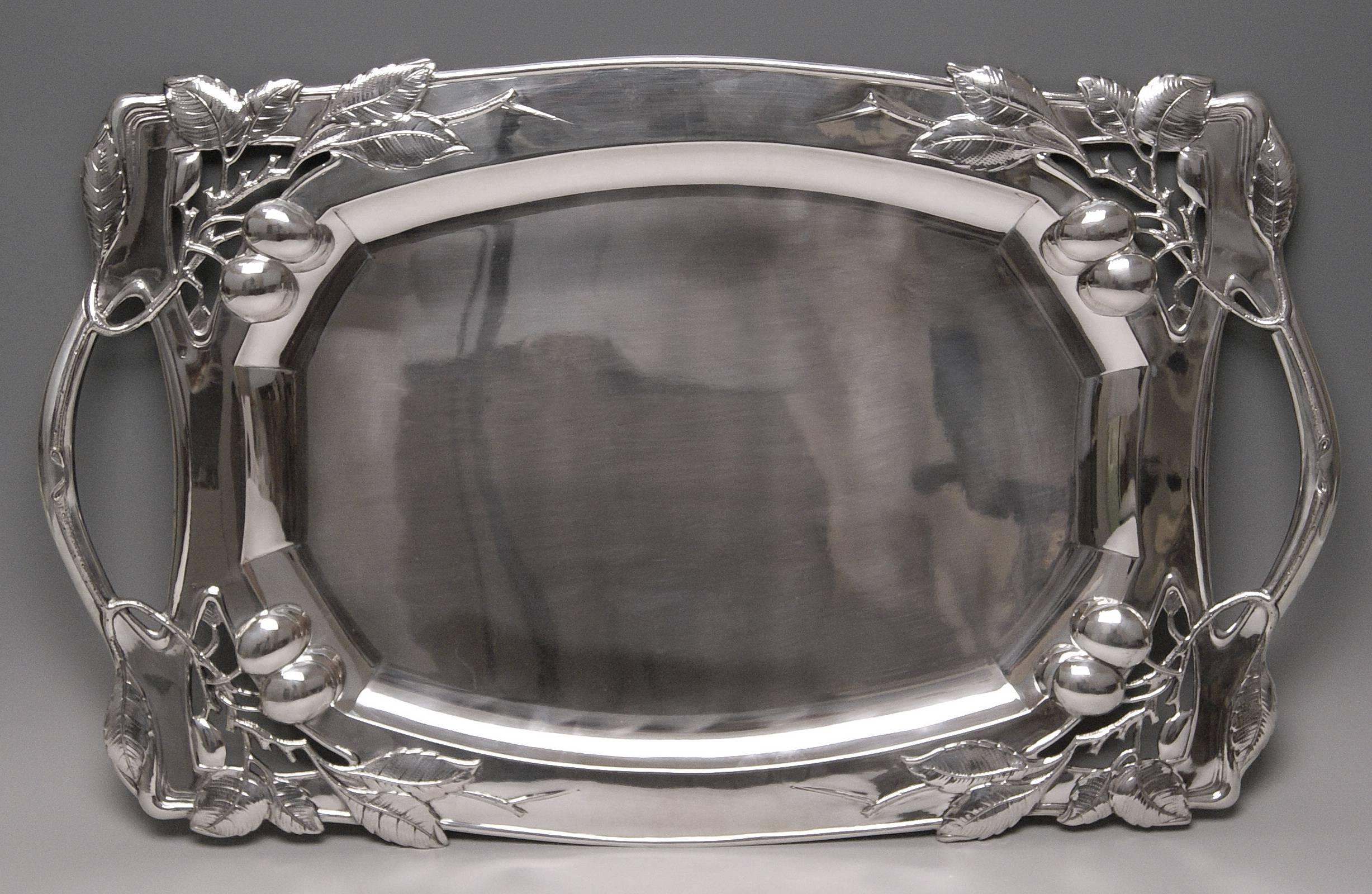 Austrian silver excellent huge serving platter Vienna
Art Nouveau / made circa 1914

Excellently made finest rectangular silver Art Nouveau Serving Platter of gorgeous appearance.
The platter's middle area has smooth surface / its edge is