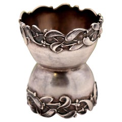 Silver base for egg holder with floral reliefs