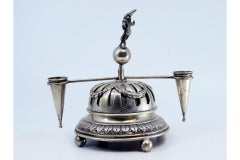 Silver bell with bows, garlands, pen holder and internal mechanism