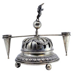 Silver bell with bows, garlands, pen holder and internal mechanism