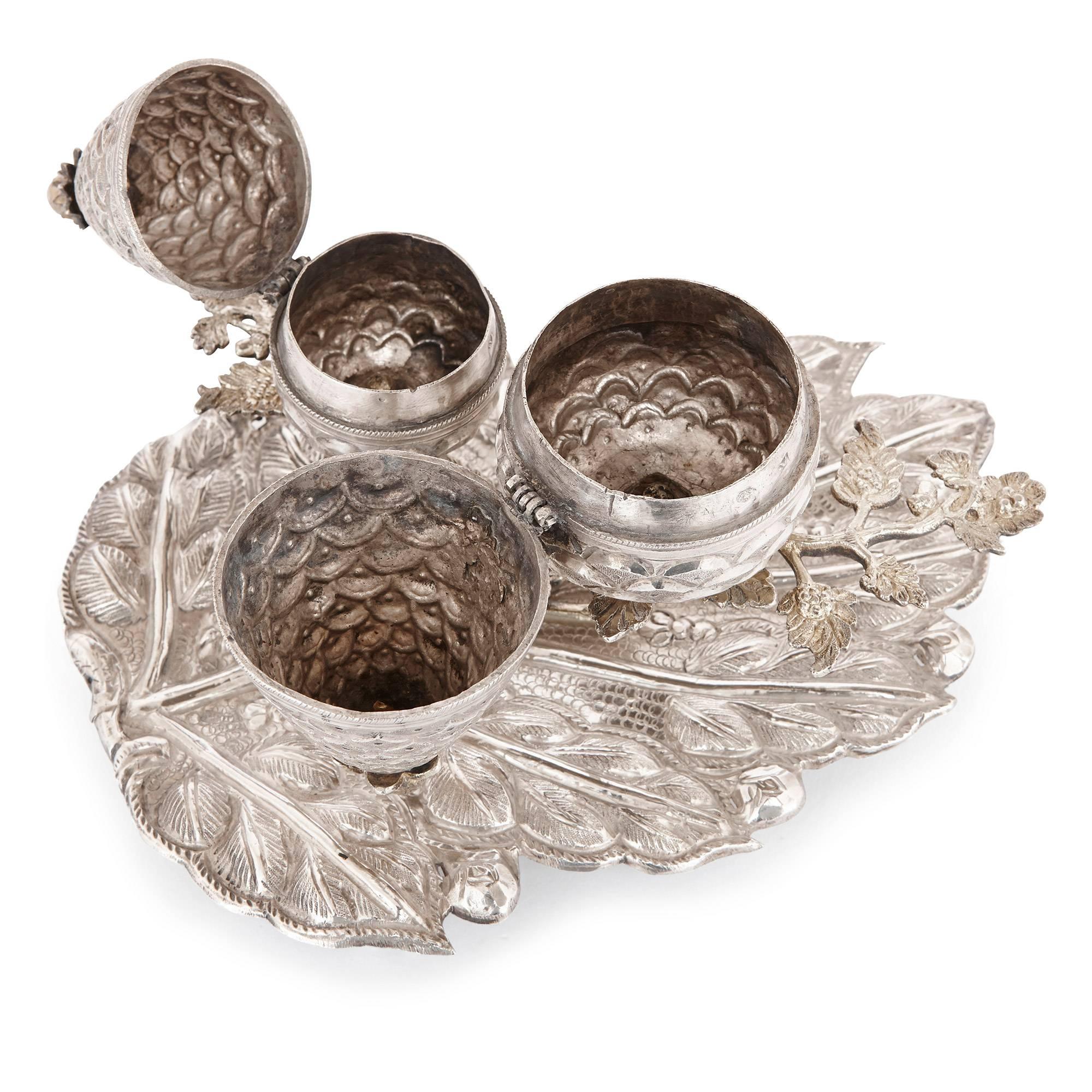 This beautifully decorated besamim, a decorative spice box used in the weekly Jewish ceremony of Havdalah, marking the conclusion of Shabbat (the Sabbath) - is a fine piece of antique Judaica which has been delicately crafted from solid silver. It