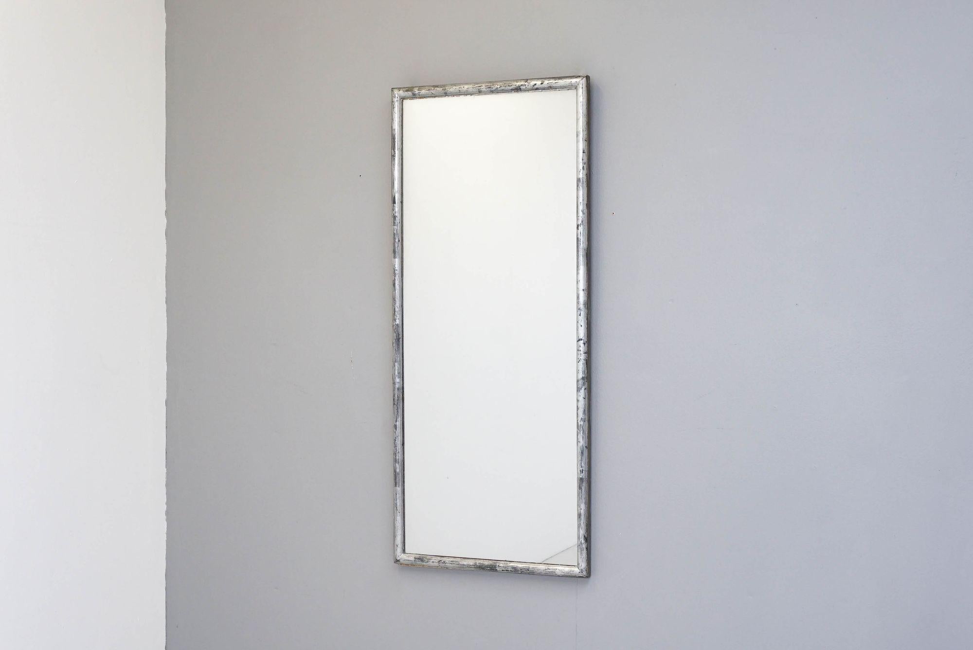 Bistro mirror with original silvered finish.

H 116cm x W 50cm x D 4cm

France Circa 1890
