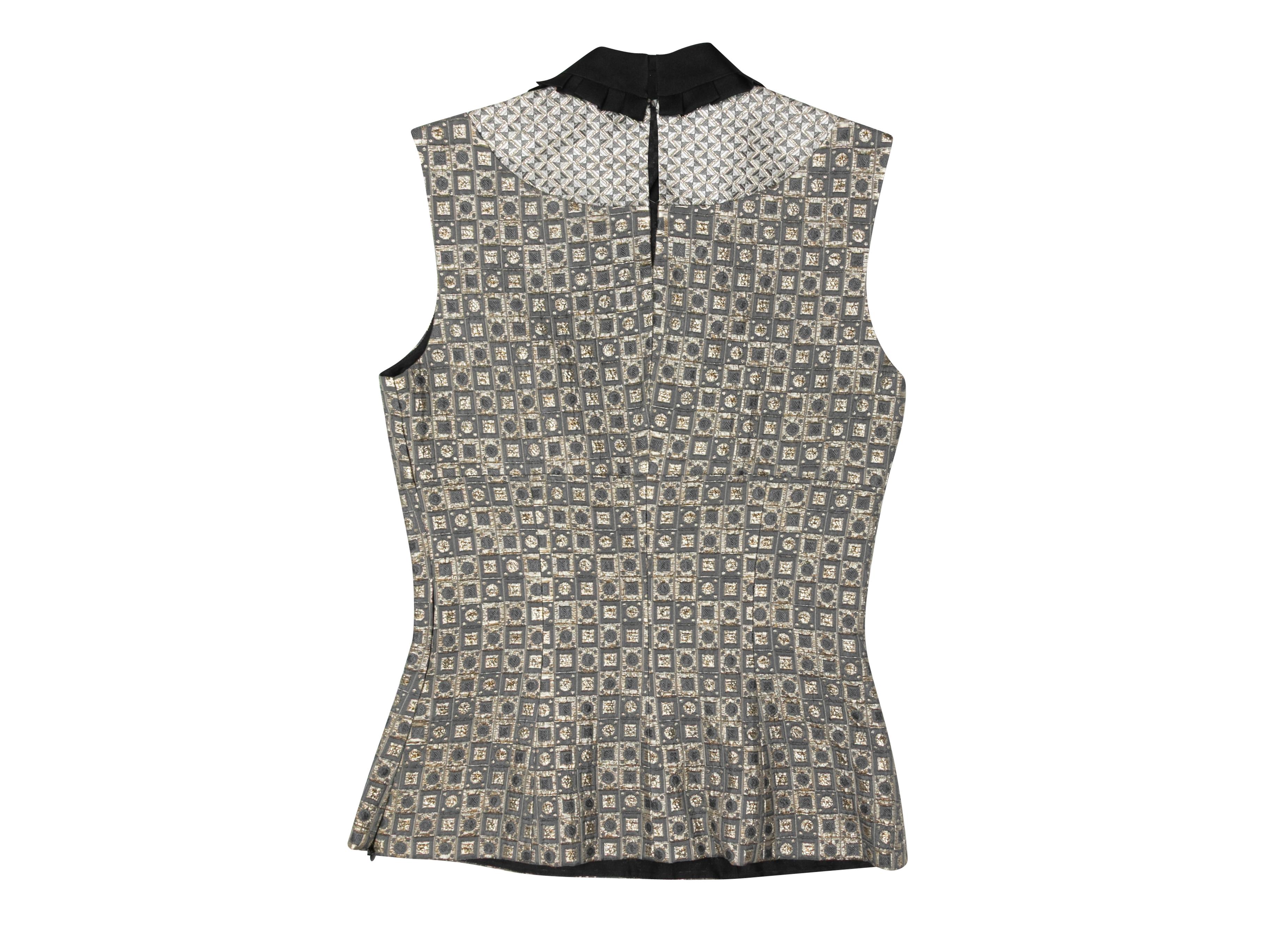 Product Details: Silver and black geometric patterned jacquard sleeveless top by Miu Miu. Peter Pan collar. Keyhole at nape. Side zip closure. 30
