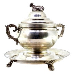 Silver bonbon jar on removable plate with goat-knob lid and four feet Silver bonbon jar on removable plate with goat-knob lid and four feet
