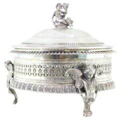 Silver bonbon jar w/ grid cut, pearly frieze, angels & knobbed lid