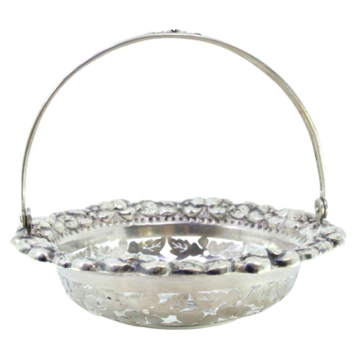 Silver bonbonniere basket w/ raised florals
hinged handle
