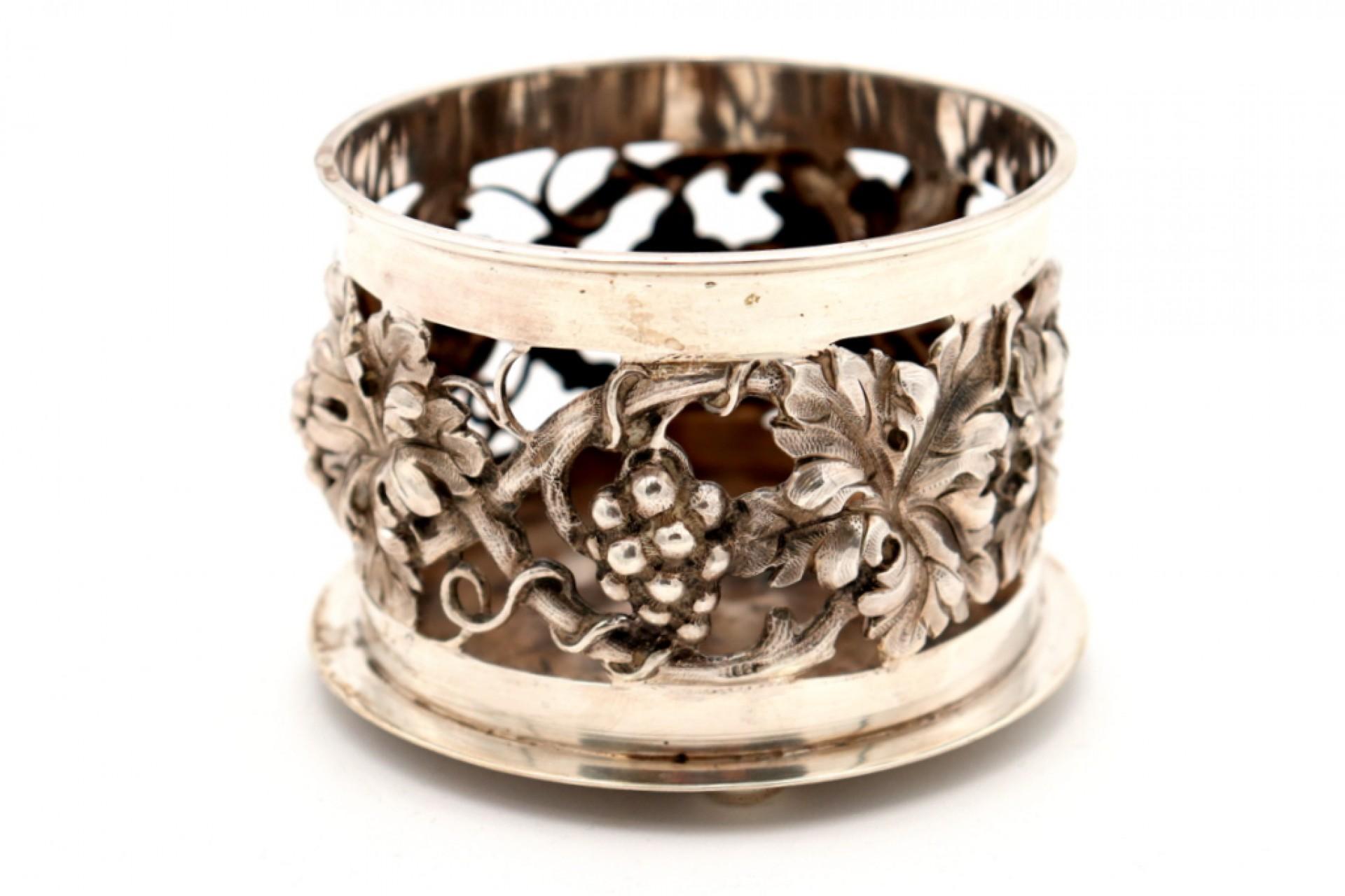 Silver bottle base with cut-out reliefs For Sale