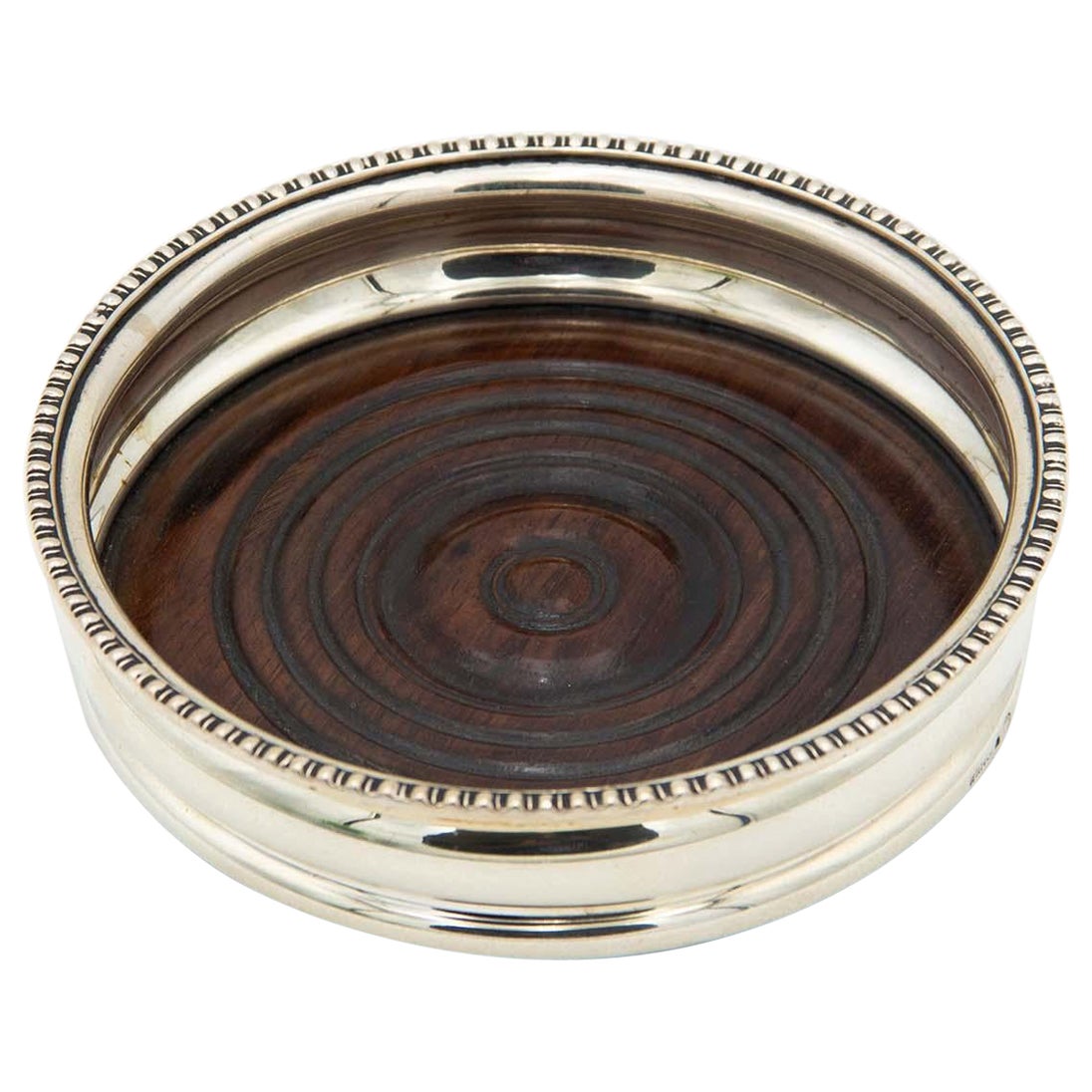 Base de botella de plata con fondo de palisandro en venta