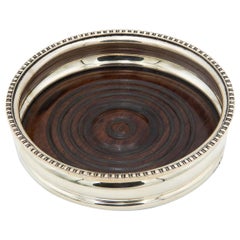 Silberner Flaschenboden mit Palisanderholzboden