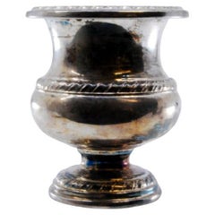 Silver bowl for flowers with reliefs on the surroundings