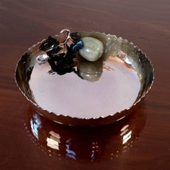 Silver bowl with natural stone sculpted leaves and fruit