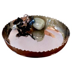 Silver bowl with natural stone sculpted leaves and fruit