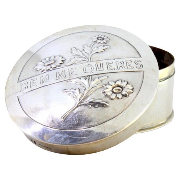 Silver box for pins and needles with marigolds embossed on the removable lid