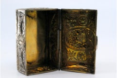 Silver box for rosary with relief and religious motifs