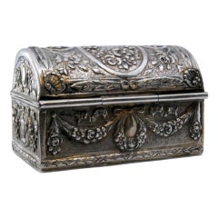 Silver box for rosary with relief and religious motifs