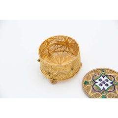 Silver box in gold filigree mesh