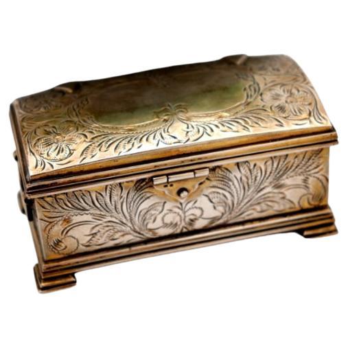 Silver box in the shape of a chest
