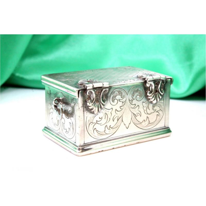 20th Century Silver box in the shape of a chest w/ reliefs & applications w/ a hinged lid For Sale