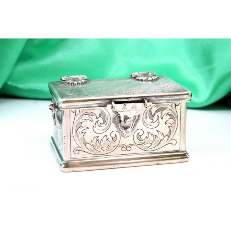Silver box in the shape of a chest w/ reliefs & applications w/ a hinged lid For Sale 1