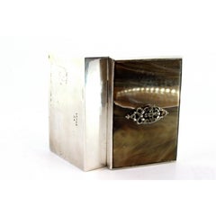 Silver box with marble hinged lid