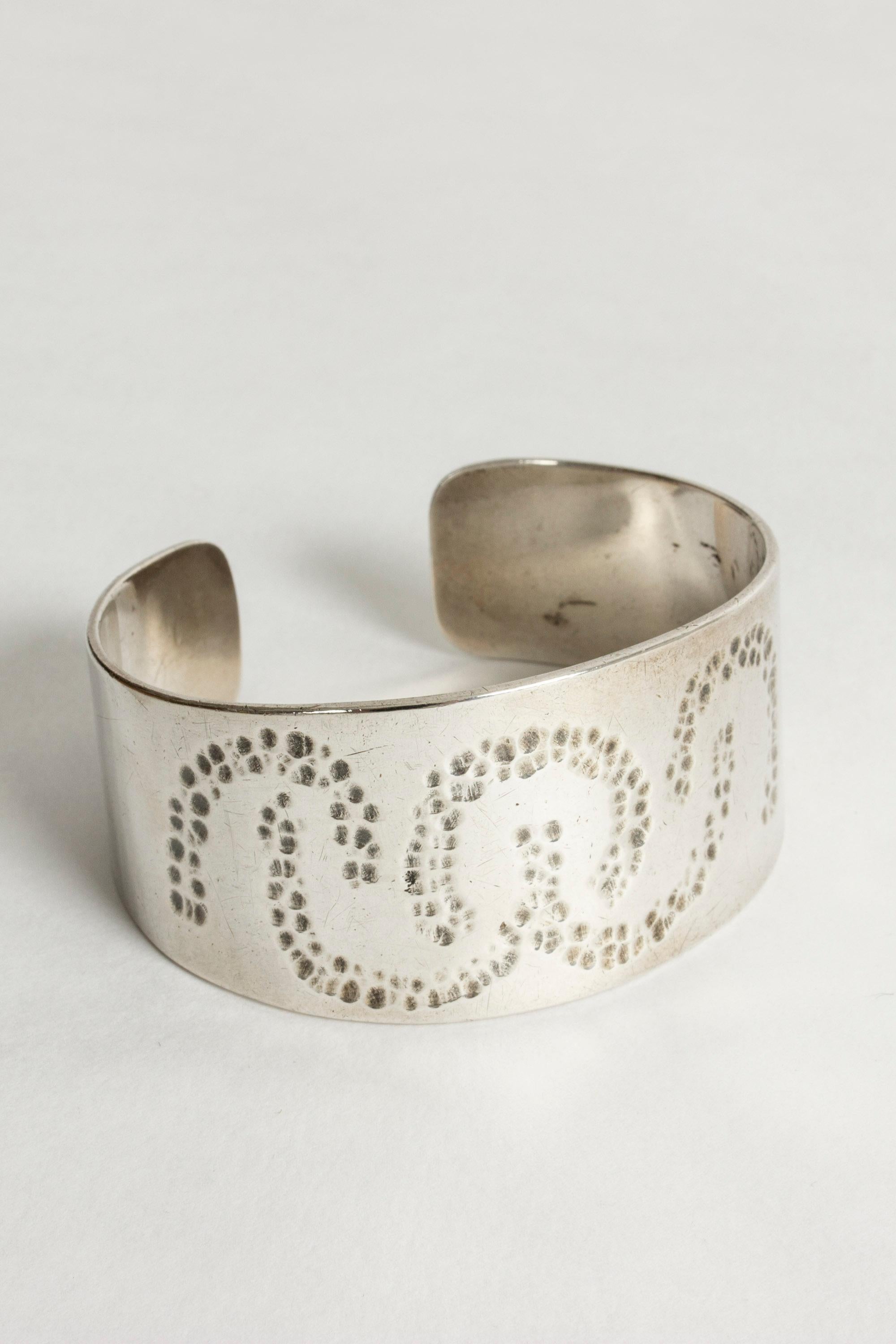 Modern silver bracelet from the firm Atelier Borgila, with a handmade, organic pattern. Heavy quality.