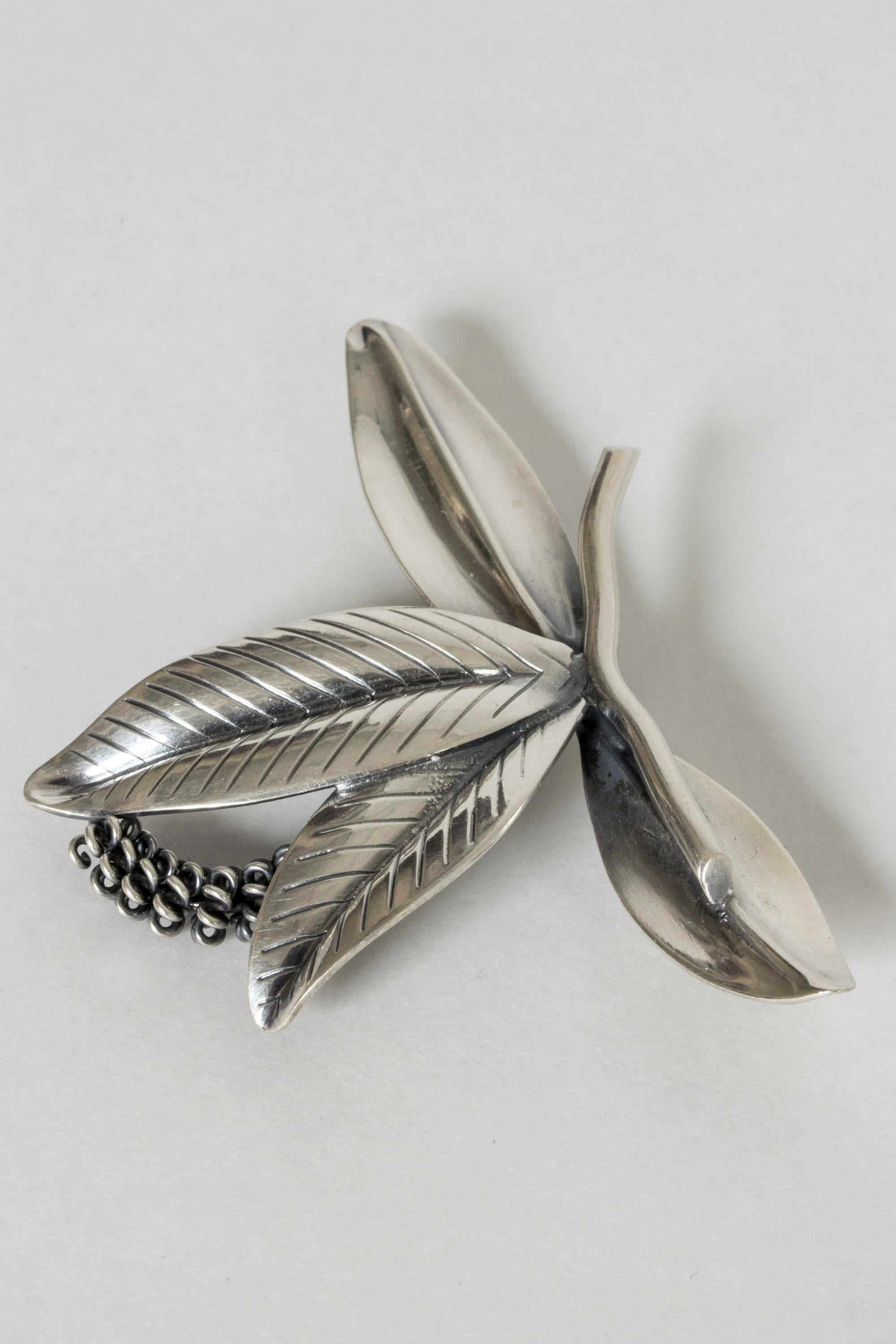 Stunning silver brooch by Gertrud Engel, in a in the form of leaves and a seed pod on a twig. Beautifully made with great attention to detail. The seed pod has a little spring to it.