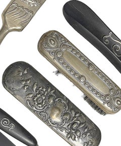 Silver - Brushes made of silver and ebony.