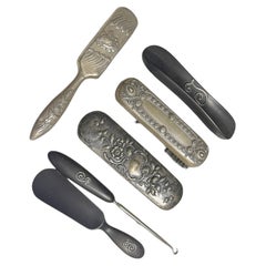 Silver - Brushes made of silver and ebony.