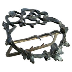 Silver buckle with floral motifs